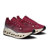 Men's On Cloudsurfer Max road running shoes in black with white accents, featuring cushioned soles and breathable mesh uppers.