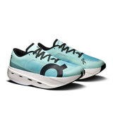 On Cloudboom Volt women's road running shoes in black with orange accents, featuring lightweight cushioning and breathable mesh.