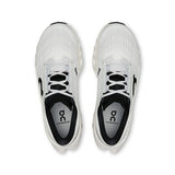 Women's On Cloudmonster 3 road running shoes in black with white accents, featuring breathable mesh and cushioned sole.