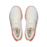 On Cloudmonster 3 women's road running shoes in black and pink, featuring lightweight cushioning and breathable mesh uppers.