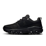 Women's On Cloudrock Low Waterproof hiking shoes with black and gray design, featuring durable waterproof material and traction soles.