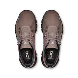 Women's On Cloud 6 Waterproof active lifestyle shoes with breathable mesh and cushioned soles, designed for outdoor activity.
