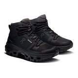 Women's On Cloudrock Mid Waterproof hiking boots with sturdy design and waterproof material, suitable for outdoor adventures.