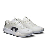 On THE ROGER Pro 3 women's tennis shoes with sleek design, supportive sole, and breathable mesh upper for performance.
