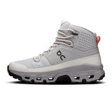 Women's On Cloudrock Mid Waterproof hiking boots with rugged design and waterproof material, ideal for outdoor adventures.