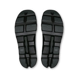 Men's On Cloudmonster 1 running shoes in black with white accents, featuring a cushioned athletic design for active life activities.