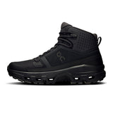 Women’s On Cloudrock Mid Waterproof hiking shoes, showing the sturdy mid-height design and waterproof material for outdoor trekking.