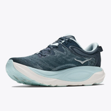 Women's Hoka Gaviota 6 wide running shoes in faded navy and glimmering blue, featuring supportive design and cushioned sole.