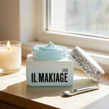 Bloomvera IL MAKIAGE Skin Hydrating Face Cream with applicator spatula, showing the moisturizing cream in a sleek jar.