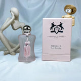 Parfums De Marly Delina Eau De Parfum 2.5oz fragrance bottle with elegant design and floral accents.