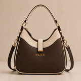 Brown and cream two-tone handbag with adjustable strap from Bagsor, featuring a stylish and versatile design.