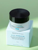 Bloomvera SkinCeuticals A.G.E. Interrupter Advanced anti-aging wrinkle face cream jar with a white lid and sleek packaging.