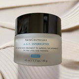 Bloomvera SkinCeuticals A.G.E. Interrupter Advanced anti-aging face cream in a jar, showcasing its smooth, rich texture and packaging.