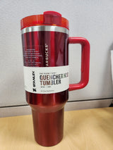 Stanley Quencher H2.0 FlowState tumbler 40 oz in stainless steel with lid, designed for keeping beverages hot or cold.