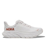 Women's Hoka Arahi 7 wide running shoes in white with blush and gold accents, featuring breathable mesh and cushioned soles.