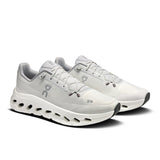 Men's On Cloudtilt active life sneakers in black with white accents, featuring sleek design and cushioned soles for comfort.