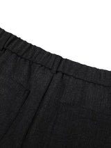 Men's high-waisted pleated wide-leg Capri pants in neutral fabric, stylish and comfortable for casual or semi-formal wear.