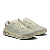 On Cloudzone women's active life shoes in black and white, featuring cushioned soles and breathable mesh upper for comfortable movement.
