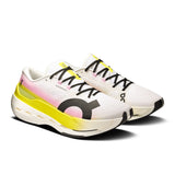 Men's On Cloudboom Max road running shoes with breathable upper and cushioned soles, designed for high-performance running.