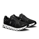 On Cloud 6 women's running shoes in black and white with cushioned soles, designed for active life and comfort.