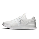 On THE ROGER Clubhouse Pro 2 men's tennis shoes with white and navy design, featuring cushioned soles and breathable mesh upper.