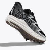 Hoka Crescendo MD shoes in white with black accents, featuring cushioned running shoe design and durable outsole.
