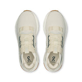 Men's On Cloudnova 2 active lifestyle sneakers in black and gray with cushioned soles and breathable mesh uppers.
