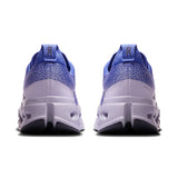 Women's On Cloudsurfer Max road running shoes in light gray with blue accents, featuring cushioned soles and breathable mesh uppers.