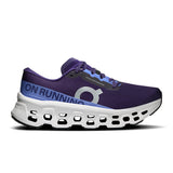 Women's On Cloudmonster 3 road running shoes with black and white design, cushioned sole, and breathable mesh upper.