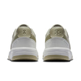 On THE ROGER Clubhouse men's tennis shoes in black with white accents, featuring breathable mesh and supportive sole.