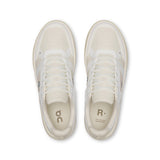 On THE ROGER Clubhouse men's tennis shoes featuring a sleek design with breathable mesh and supportive rubber soles.