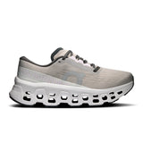 Women's On Cloudmonster 3 road running shoes with cushioned soles and sporty design, featuring gray and teal accents.