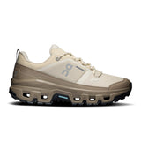 Women's On Cloudrock Low Waterproof hiking shoes, black and gray, featuring durable waterproof material and rugged outdoor sole.