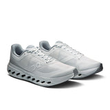 Men's On Cloudsurfer Next road running shoes in black with white accents, featuring cushioned soles and breathable mesh upper.