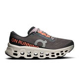 Women's On Cloudmonster 3 road running shoes with breathable mesh upper, cushioned sole, and vibrant design.
