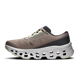 Women's On Cloudmonster 3 road running shoes featuring a sleek design with breathable mesh and cushioned soles.