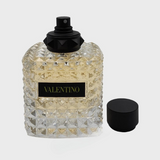 Valentino DONNA Born In Roma Yellow Dream perfume bottle with sleek design and vibrant yellow accents.