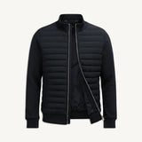 Men's Zexov quilted bomber jacket, lightweight and stylish, shown on a hanger with a smooth, padded exterior and ribbed cuffs.