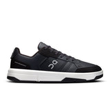 On THE ROGER Clubhouse men's tennis shoes in black with white accents, featuring a sleek athletic design and cushioned sole.
