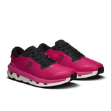 On Cloudzone women's active life shoes in black and pink, with breathable mesh upper and cushioned soles for running.