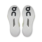 On THE ROGER Pro 3 women's tennis shoes in white with black accents, featuring sleek design and cushioned sole for performance.