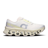 On Cloudmonster 3 women's road running shoes in black with blue accents, featuring cushioned soles and breathable mesh upper.