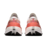 Women's On Cloudboom Max road running shoes with lightweight mesh upper and cushioned sole for high-performance running.