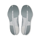 Men's On Cloudsurfer Next road running shoes in gray and black with cushioned soles and breathable mesh upper.