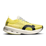 Men's On Cloudboom Strike road running shoes in black with white and gray accents, featuring a sleek design and cushioned sole.