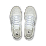 On THE ROGER Clubhouse men's tennis shoes with white and black design, lightweight athletic footwear for tennis players.