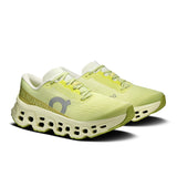 Women's On Cloudmonster 3 road running shoes with black and pink design, featuring cushioned soles and breathable mesh upper.
