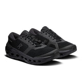 Women's On Cloudrunner 3 road running shoes in gray and white with cushioned soles, designed for comfort and performance.