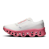 Women's On Cloudmonster 3 road running shoes with cushioned soles and breathable mesh uppers, designed for comfort and performance.