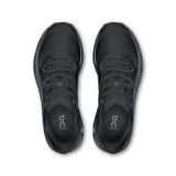 On Cloudzone women's active life shoes in black with white accents, showcasing the athletic sneaker design and lightweight cushioning.
